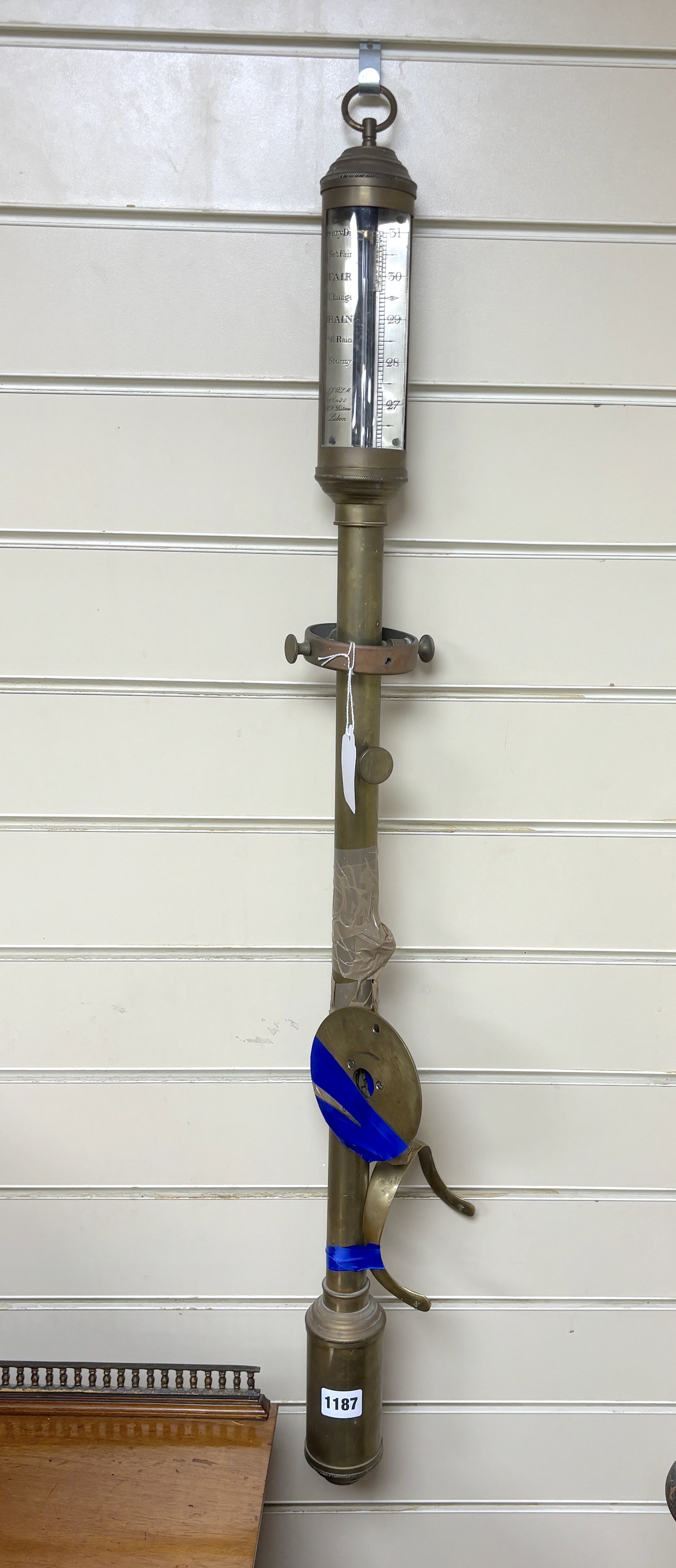 A brass ship's barometer with gimbal mount, height 95cm